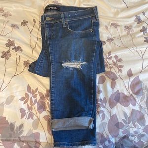Mid-rise medium washed distressed, cropped skinny jeans
